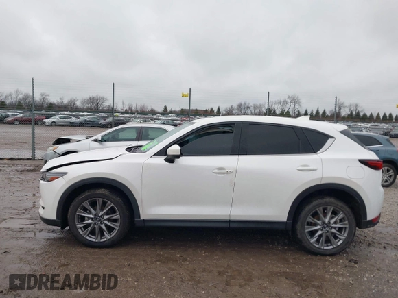 2021 Mazda CX-5 Grand Touring with VIN JM3KFADM4M1340141, listed as a IAAI auction lot 41194711 with 37,887 mi miles. Bid and sale history available at carsss.com. Image 14.