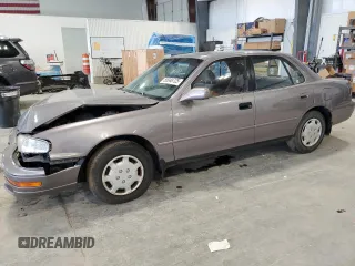 1994 Toyota Camry LE z VIN 4T1SK12E8RU407907, wystawiony jako Copart lot #55048725 z przebiegiem 134 372 mil mil oraz Szkoda całkowita • Salvage title. Historia ofert i sprzedaży dostępna na DreamBid. Obrazek 1.