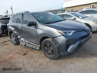 2018 Toyota RAV4 LE with VIN JTMZFREV4JJ183106, listed as a IAAI auction lot 41449468 with 114,719 mi miles. Bid and sale history available at carsss.com. Image 1.