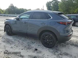 2024 Mazda CX-30 S Carbon Edition с VIN 3MVDMBCMXRM604194, выставлен на аукционе Copart как лот 54777125 с пробегом 9 816 миль миль и Списание • Salvage title. История ставок и продаж доступна на DreamBid. Изображение 2.