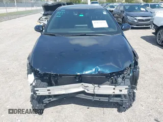 2019 Toyota Corolla Hatchback SE with VIN JTNK4RBE3K3061589, listed as a IAAI auction lot 42123273 with 90,491 mi miles. Bid and sale history available at carsss.com. Image 12.