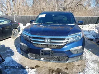 2017 Honda Pilot Touring with VIN 5FNYF6H99HB105446, listed as a IAAI auction lot 41283368 with 91,452 mi miles and . Bid and sale history available at DreamBid. Image 13.