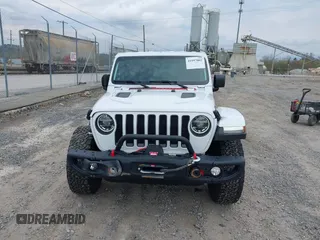 2021 Jeep Wrangler Unlimited Rubicon z VIN 1C4HJXFG1MW577829, wystawiony jako IAAI lot #41997002 z przebiegiem 26 443 mil mil oraz . Historia ofert i sprzedaży dostępna na DreamBid. Obrazek 13.