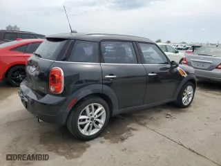2013 MINI Cooper Countryman with VIN WMWZB3C56DWM08030, listed as a Copart auction lot 50261555 with 91,111 mi miles and Salvage Title. Bid and sale history available at carsss.com. Image 3.
