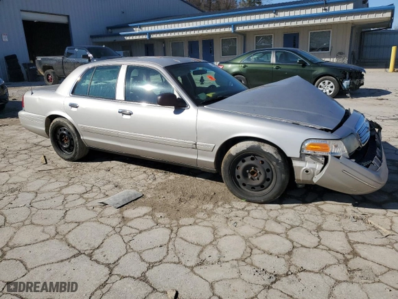 2005 Ford Crown Victoria LX with VIN 2FAFP74W85X121659, listed as a Copart auction lot 44399655 with 145,525 mi miles and Salvage Title. Bid and sale history available at carsss.com. Image 4.