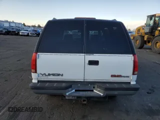 1997 GMC Yukon with VIN 1GKEK13R0VJ734501, listed as a Copart auction lot 48413785 with 165,440 mi miles and Clean Title. Bid and sale history available at carsss.com. Image 6.