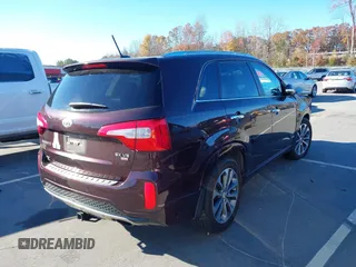 2014 Kia Sorento SX with VIN 5XYKWDA78EG538618, listed as a IAAI auction lot 40943738 with 162,208 mi miles and . Bid and sale history available at DreamBid. Image 4.