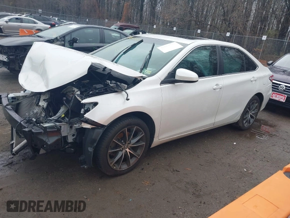 2016 Toyota Camry XSE with VIN 4T1BK1FK2GU571473, listed as a IAAI auction lot 41095181 with 63,677 mi miles. Bid and sale history available at carsss.com. Image 2.