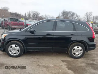 2011 Honda CR-V LX with VIN 5J6RE4H37BL020739, listed as a IAAI auction lot 41502362 with 220,256 mi miles. Bid and sale history available at carsss.com. Image 14.