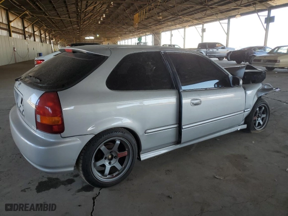 1996 Honda Civic DX with VIN 2HGEJ634XTH105568, listed as a Copart auction lot 69697714 with 130,880 mi miles and Salvage Title. Bid and sale history available at carsss.com. Image 3.