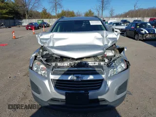 2016 Chevrolet Trax LT z VIN 3GNCJLSB7GL162268, wystawiony jako IAAI lot #41753118 z przebiegiem 123 599 mil mil oraz . Historia ofert i sprzedaży dostępna na DreamBid. Obrazek 12.