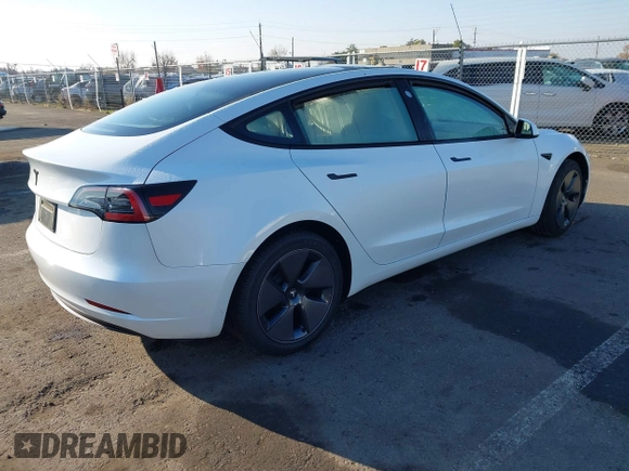 2023 Tesla Model 3 with VIN 5YJ3E1EA2PF582331, listed as a IAAI auction lot 41043858 with 33,601 mi miles and . Bid and sale history available at DreamBid. Image 4.