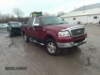 2005 Ford F-150 XLT with VIN 1FTPW14565KE49963, listed as a IAAI auction lot 41709433 with 202,322 mi miles. Bid and sale history available at carsss.com. Image 1.