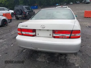 2001 Lexus ES 300 z VIN JT8BF28G410307451, wystawiony jako IAAI lot #42369871 z przebiegiem 290 620 mil mil oraz . Historia ofert i sprzedaży dostępna na DreamBid. Obrazek 16.