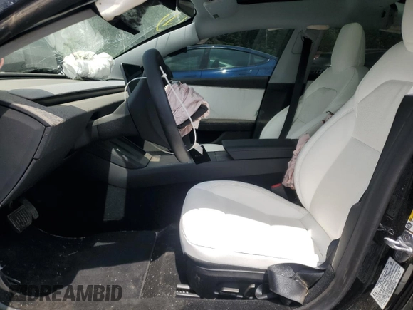 2025 Tesla Model 3 Long Range with VIN 5YJ3E1EB6SF923974, listed as a Copart auction lot 57059495 with 9,108 mi miles and Salvage title. Bid and sale history available at DreamBid. Image 7.