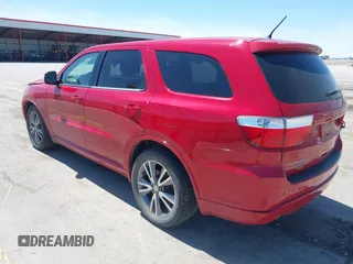 2013 Dodge Durango R/T with VIN 1C4SDJCTXDC697240, listed as a IAAI auction lot 42209558 with 130,735 mi miles and . Bid and sale history available at DreamBid. Image 3.