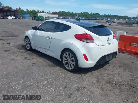 2012 Hyundai Veloster w/Gray Int z VIN KMHTC6ADXCU050034, wystawiony jako IAAI lot #42506584 z przebiegiem 142 514 mil mil oraz . Historia ofert i sprzedaży dostępna na DreamBid. Obrazek 3.
