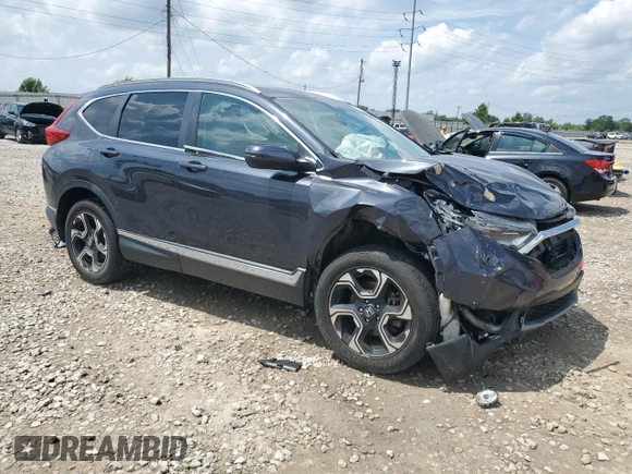 2018 Honda CR-V Touring with VIN 2HKRW2H9XJH605264, listed as a Copart auction lot 61500315 with 106,616 mi miles and Salvage title. Bid and sale history available at DreamBid. Image 4.