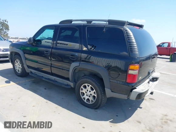 2001 Chevrolet Tahoe LT with VIN 1GNEK13T41R197657, listed as a IAAI auction lot 42164367 with 200,507 mi miles. Bid and sale history available at carsss.com. Image 3.
