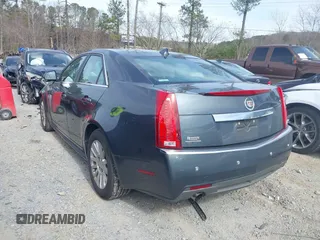 2012 Cadillac CTS Luxury with VIN 1G6DE5E58C0143175, listed as a IAAI auction lot 41612743 with 148,764 mi miles and . Bid and sale history available at DreamBid. Image 3.