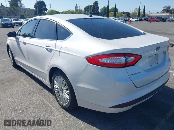 2016 Ford Fusion SE Hybrid with VIN 3FA6P0LU1GR385184, listed as a IAAI auction lot 39230513 with 106,311 mi miles. Bid and sale history available at carsss.com. Image 3.