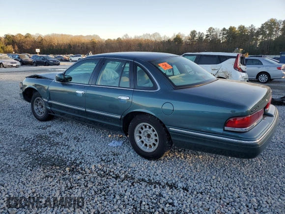 1996 Ford Crown Victoria LX z VIN 2FALP74W0TX205507, wystawiony jako Copart lot #85310874 z przebiegiem 51 646 mil mil oraz Szkoda całkowita • Salvage title. Historia ofert i sprzedaży dostępna na DreamBid. Obrazek 2.