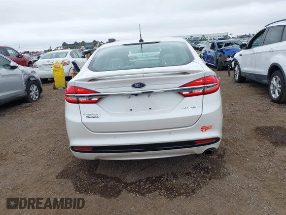 2017 Ford Fusion Titanium with VIN 3FA6P0SU2HR379834, listed as a IAAI auction lot 42440382 with 55,646 mi miles and . Bid and sale history available at DreamBid. Image 16.