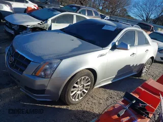 2010 Cadillac CTS Luxury with VIN 1G6DE5EG6A0111713, listed as a IAAI auction lot 41151719 with 138,277 mi miles and . Bid and sale history available at DreamBid. Image 2.
