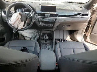 2021 BMW X1 xDrive28i with VIN WBXJG9C09M5S52289, listed as a Copart auction lot 64413105 with Not provided miles and Salvage title. Bid and sale history available at DreamBid. Image 8.