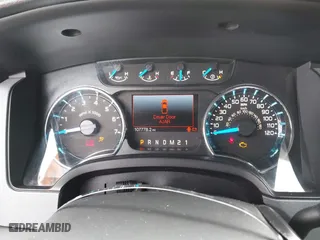 2014 Ford F-150 XL with VIN 1FTMF1CM2EFA69992, listed as a IAAI auction lot 41738432 with 107,778 mi miles. Bid and sale history available at carsss.com. Image 7.