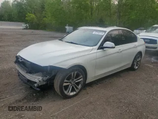 2018 BMW 3 Series 330i xDrive with VIN WBA8D9C50JA614509, listed as a Copart auction lot 57240115 with 153,677 mi miles and Clean title. Bid and sale history available at DreamBid. Image 1.