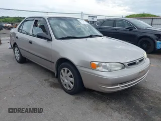 2000 Toyota Corolla VE with VIN 1NXBR12E6YZ310375, listed as a IAAI auction lot 42625543 with 220,414 mi miles and . Bid and sale history available at DreamBid. Image 1.