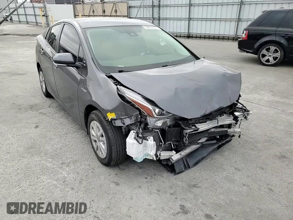 2021 Toyota Prius L Eco with VIN JTDKAMFU8M3130779, listed as a Copart auction lot 56452395 with 86,094 mi miles and Salvage title. Bid and sale history available at DreamBid. Image 14.
