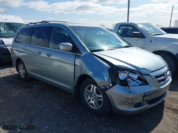 2005 Honda Odyssey EX-L with VIN 5FNRL38765B094377, listed as a IAAI auction lot 41933616 with 213,979 mi miles. Bid and sale history available at carsss.com. Image 1.