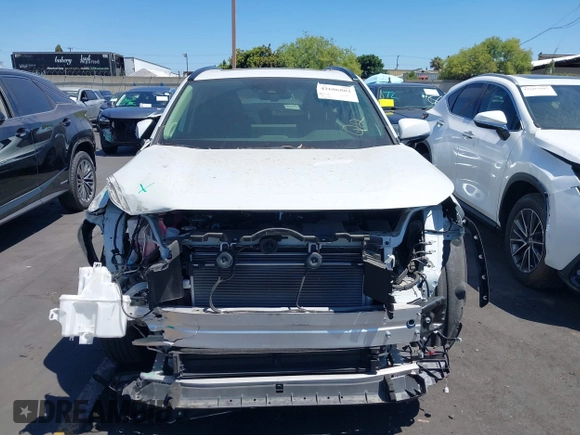 2023 Toyota RAV4 Hybrid XLE Premium with VIN JTMB6RFV0PD087237, listed as a IAAI auction lot 42606802 with 16,872 mi miles and . Bid and sale history available at DreamBid. Image 13.