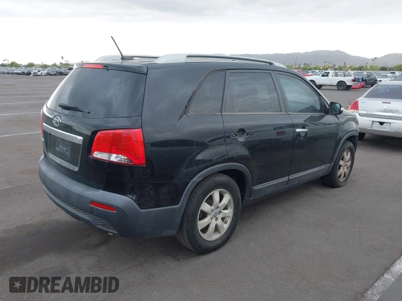 2012 Kia Sorento LX with VIN 5XYKT3A6XCG247528, listed as a IAAI auction lot 42194338 with 123,565 mi miles and . Bid and sale history available at carsss.com. Image 4.