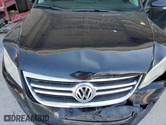2011 Volkswagen Tiguan SE with VIN WVGBV7AX3BW520381, listed as a Copart auction lot 52288555 with 170,460 mi miles and Salvage Title. Bid and sale history available at DreamBid. Image 11.