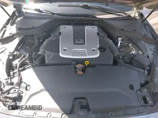 2014 Infiniti Q50 Premium with VIN JN1BV7AP5EM672766, listed as a IAAI auction lot 42107952 with 66,929 mi miles. Bid and sale history available at carsss.com. Image 10.