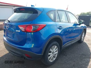 2014 Mazda CX-5 Sport z VIN JM3KE4BE7E0351982, wystawiony jako IAAI lot #42767499 z przebiegiem 154 774 mil mil oraz . Historia ofert i sprzedaży dostępna na DreamBid. Obrazek 4.