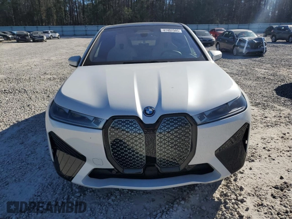 2024 BMW iX M60 with VIN WB533CF04RCP50036, listed as a Copart auction lot 47402505 with 9,345 mi miles and Salvage Title. Bid and sale history available at carsss.com. Image 5.