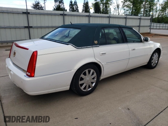 2006 Cadillac DTS 1SD z VIN 1G6KD57Y86U146074, wystawiony jako Copart lot #52917235 z przebiegiem 133 956 mil mil oraz Tytuł czysty. Historia ofert i sprzedaży dostępna na DreamBid. Obrazek 3.