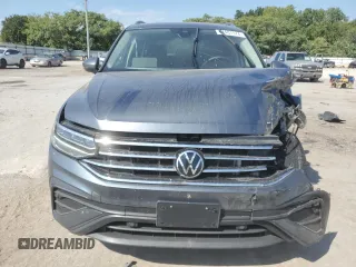 2023 Volkswagen Tiguan SE z VIN 3VVMB7AX5PM003548, wystawiony jako Copart lot #71401574 z przebiegiem 30 136 mil mil oraz Szkoda całkowita • Salvage title. Historia ofert i sprzedaży dostępna na DreamBid. Obrazek 5.