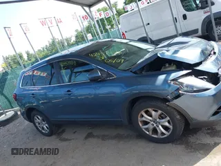 2014 Mazda CX-9 Touring with VIN JM3TB3CV7E0440747, listed as a IAAI auction lot 42457709 with 166,588 mi miles and . Bid and sale history available at DreamBid. Image 13.