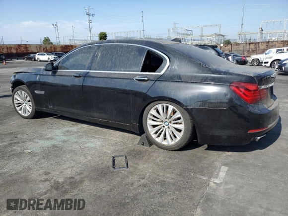 2015 BMW 7 Series 740Li with VIN WBAYE4C52FD946831, listed as a Copart auction lot 49014195 with 137,447 mi miles and Salvage Title. Bid and sale history available at DreamBid. Image 2.