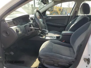2012 Chevrolet Impala LS Fleet with VIN 2G1WF5E34C1126565, listed as a Copart auction lot 60233495 with 154,528 mi miles and Salvage title. Bid and sale history available at DreamBid. Image 7.