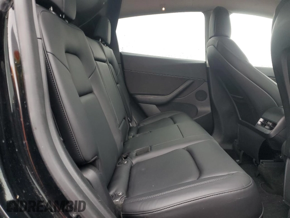 2022 Tesla Model Y Performance z VIN 7SAYGDEF9NF382883, wystawiony jako Copart lot #52028085 z przebiegiem 49 108 mil mil oraz Szkoda całkowita • Salvage title. Historia ofert i sprzedaży dostępna na DreamBid. Obrazek 10.