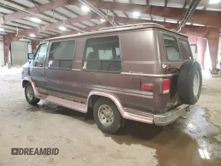 1992 Chevrolet Chevy Van z VIN 2GBEG25K3N4150299, wystawiony jako Copart lot #74099444 z przebiegiem 156 341 mil mil oraz Tytuł czysty. Historia ofert i sprzedaży dostępna na DreamBid. Obrazek 2.
