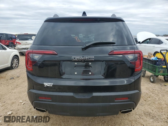 2021 GMC Acadia SLE with VIN 1GKKNKLS9MZ108979, listed as a Copart auction lot 84821504 with 34,164 mi miles and Salvage Title. Bid and sale history available at DreamBid. Image 6.