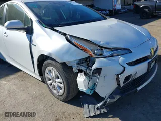 2022 Toyota Prius L Eco with VIN JTDKAMFU2N3161771, listed as a IAAI auction lot 41428804 with 113,777 mi miles. Bid and sale history available at carsss.com. Image 6.