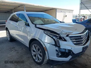 2017 Cadillac XT5 Luxury FWD z VIN 1GYKNBRS1HZ239049, wystawiony jako IAAI lot #42048882 z przebiegiem 104 412 mil mil oraz . Historia ofert i sprzedaży dostępna na DreamBid. Obrazek 1.